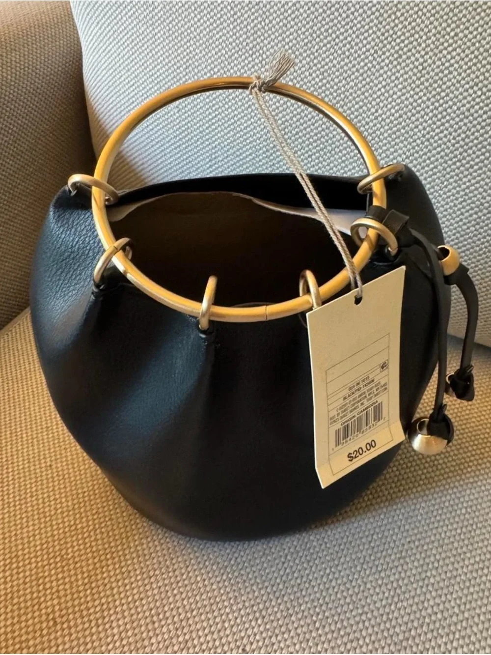 Women’s Black Leather-Textured Bucket Bag with Gold Ring Handle